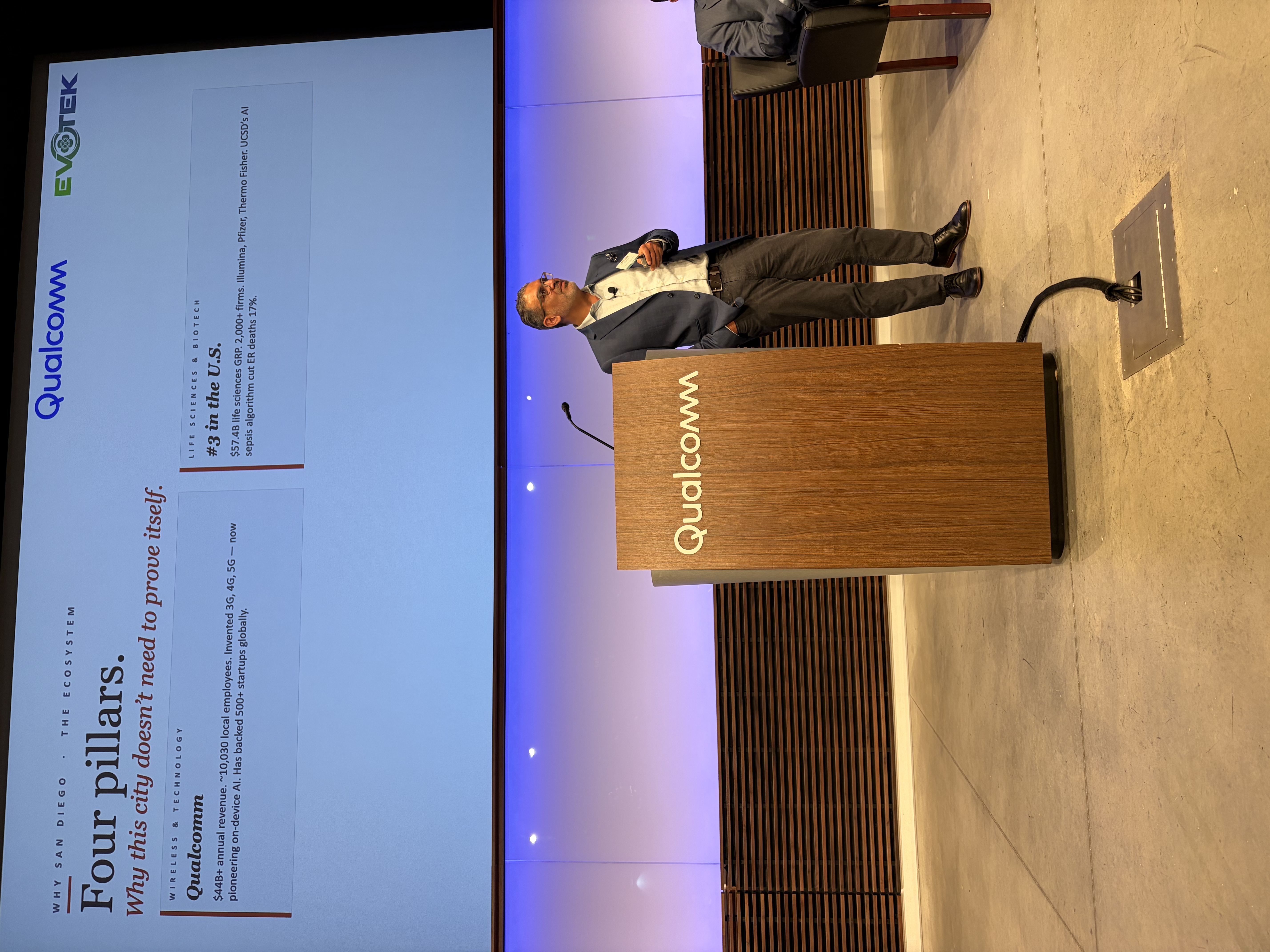 Moudy Elbayadi presenting at the EVOTEK Qualcomm AI Summit